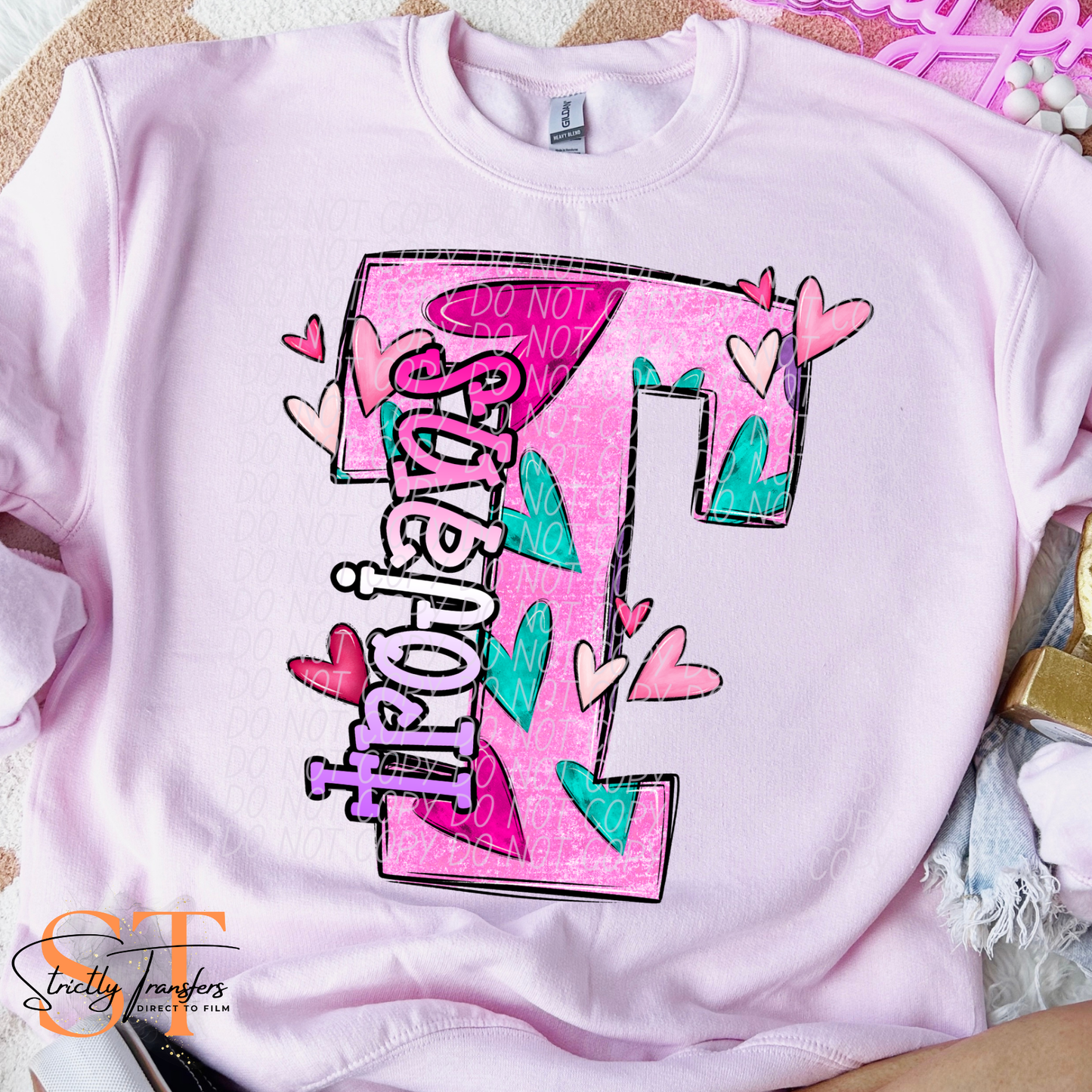 Trojans Pink Heart Initial Direct to Film Transfers